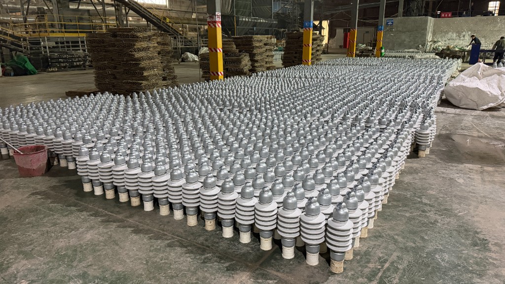 YUPG ELECTRIC — high-volume porcelain insulator production floor